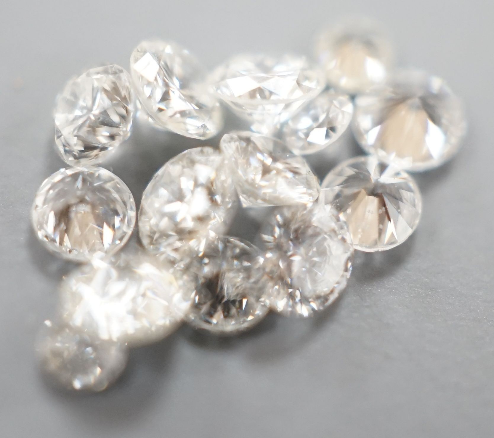 Fourteen small unmounted cut diamonds, total weight approx. 0.58ct.